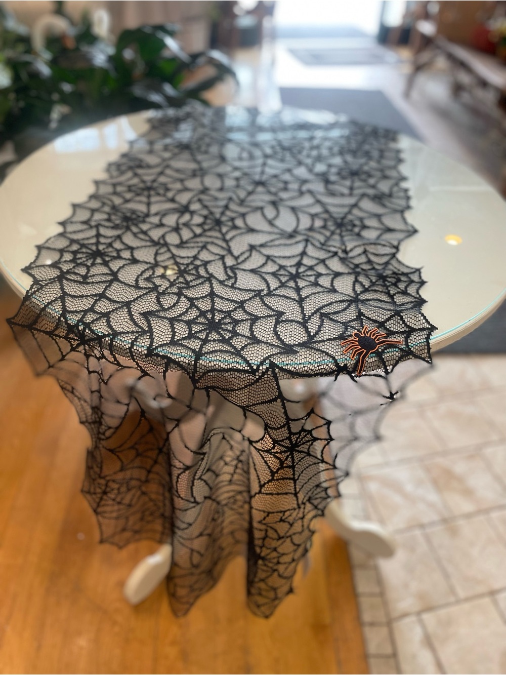 Heritage Black Spiderweb Lace Table Runner with Orange Spider Accent